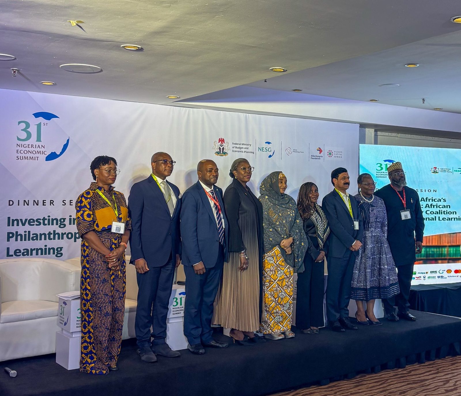 Coalition leaders and partners stand together on stage at the 31st Nigerian Economic Summit