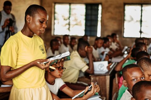 A kid reading a book